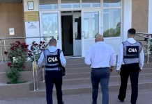 Percheziții CNA în Taraclia: Președintele raionului, vizat într-un dosar de trucare a licitațiilor