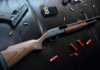 Pistol și cartușe de luptă și de vânătoare, găsite în timpul unor percheziții la Drochia